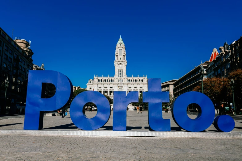 a blue sign that reads potol in the city