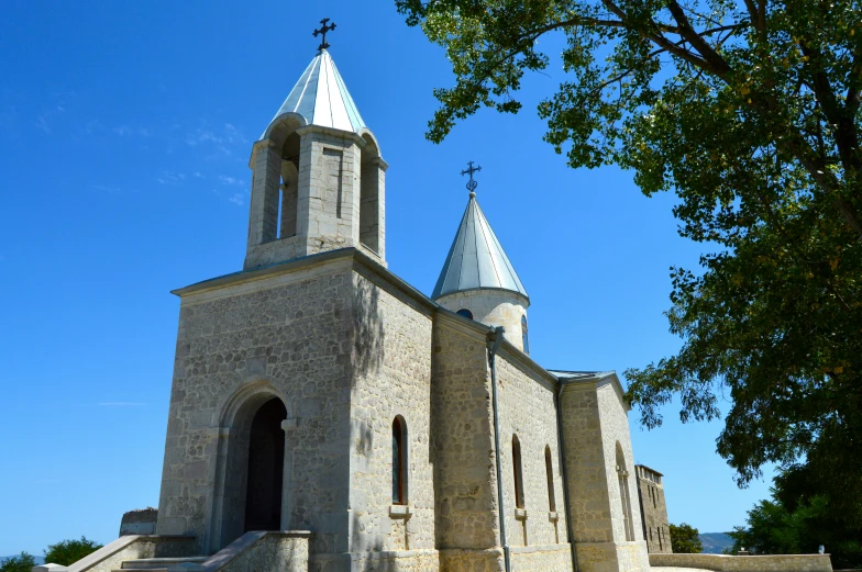 a cathedral is shown with tall spires