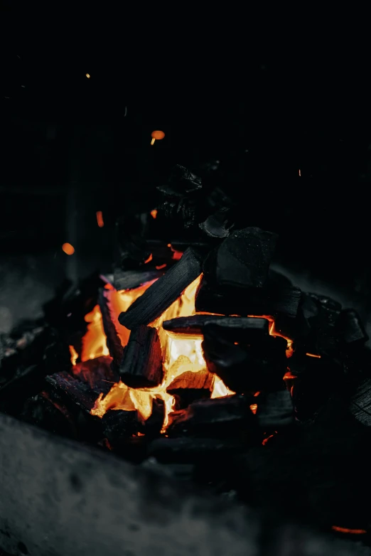 a close up of the inside of a campfire