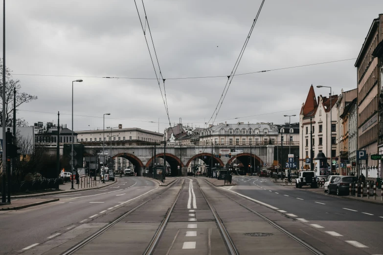 a street that has been rundown with electrical cables overhead