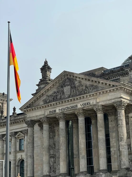 a building with a flag on top