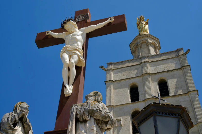 a large statue that is on the side of a building