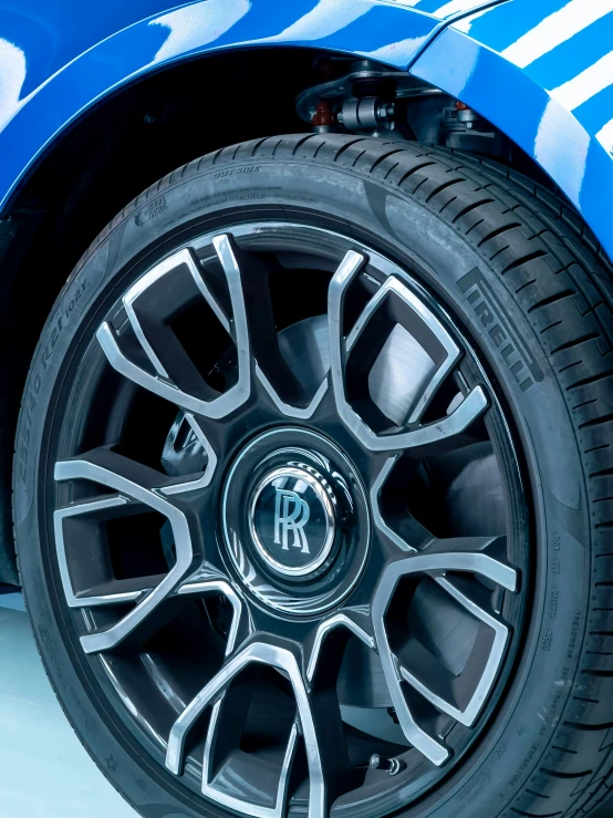 a car tire with blue and white stripes