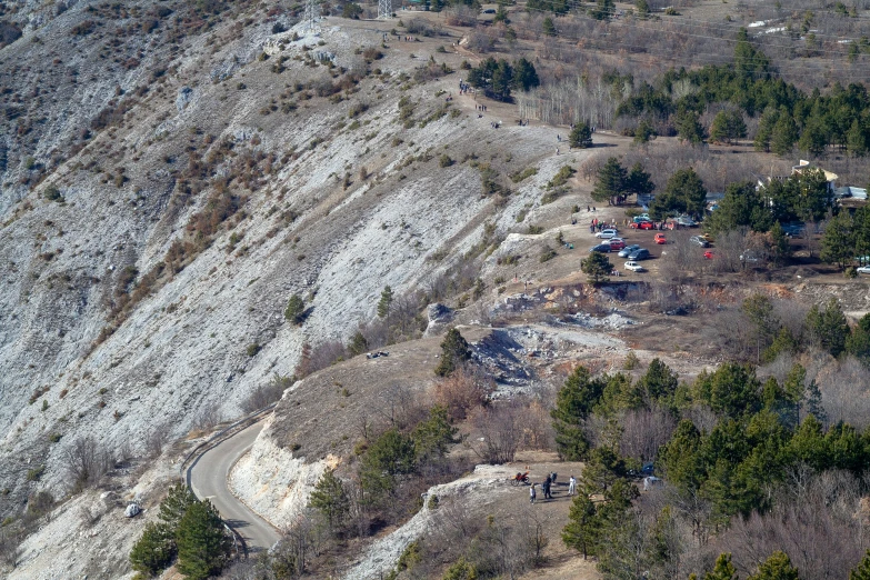 an aerial view shows the road and cliffs