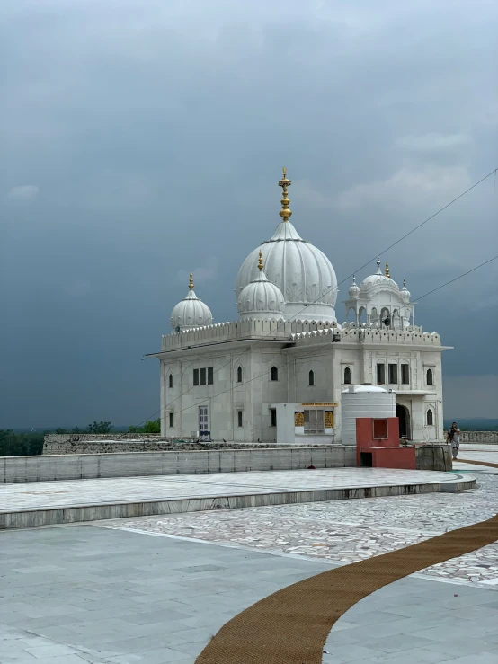 the white building has several domed domes on top