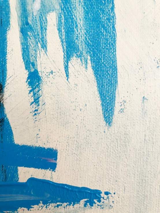 a blue painting on canvas that is looking like two people