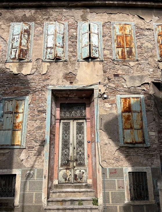 a building with several doors and windows on it