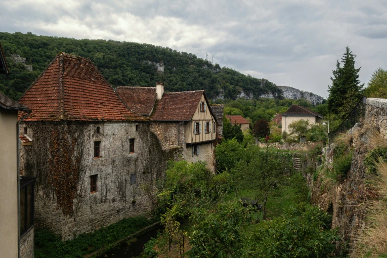 a long, old road with buildings on the sides