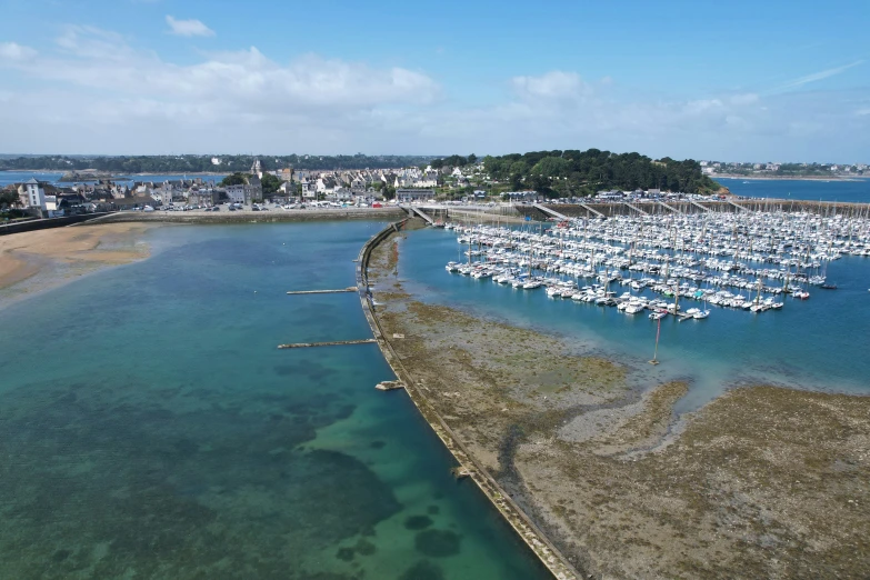 there are some boats that are parked at the dock