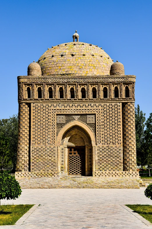 a small building built of bricks that look like a domed