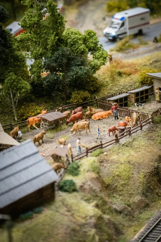 this is a small fake town with horses and wagons