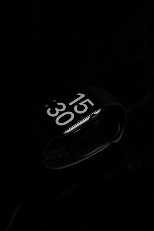 a watch on the wrist with numbers displayed