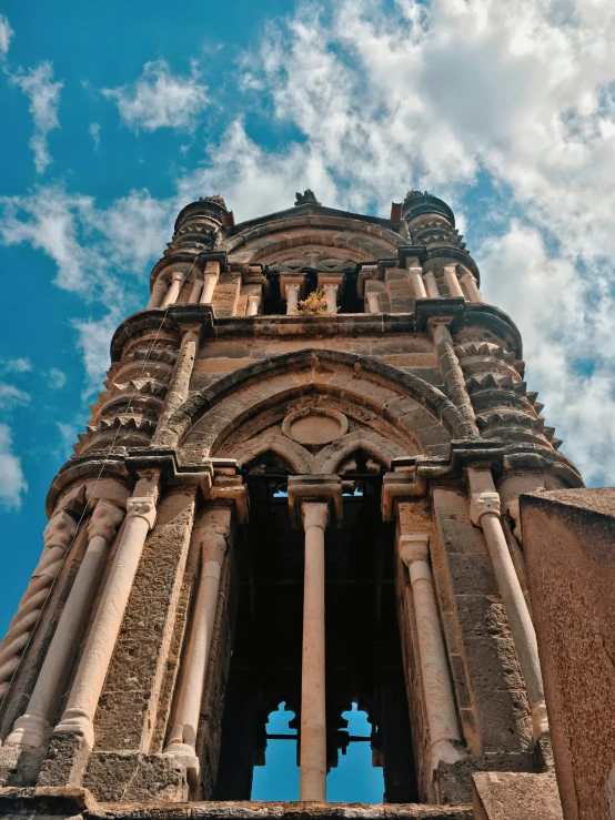 an old tower with a clock is pictured