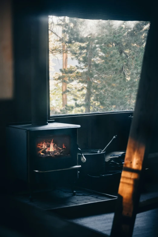 the view from the window shows a stove in the middle