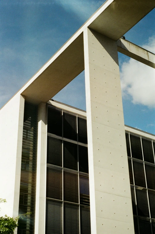 a street light and building with a white clock