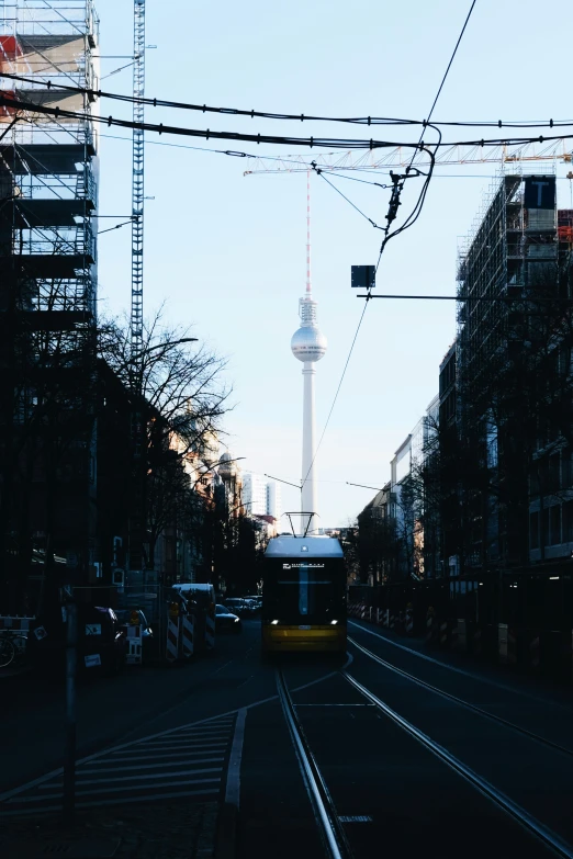 the view down the road of the city and its tall spire