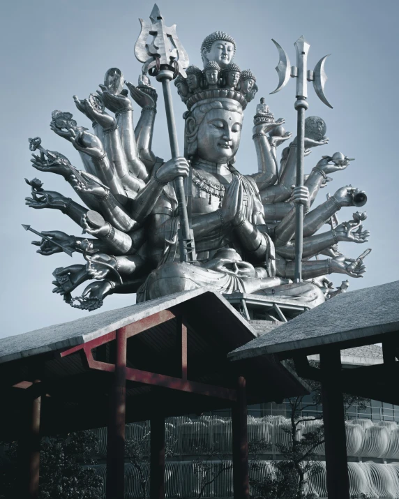 a statue of lord rama is the centerpiece of a building