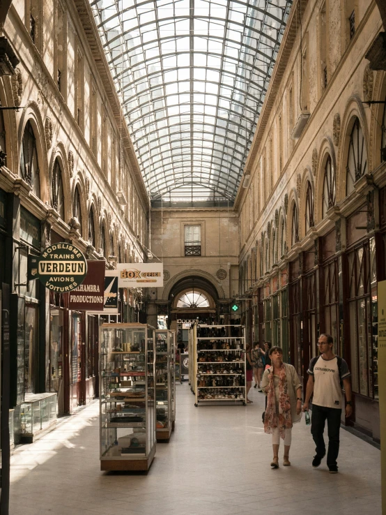 an underground passage with a domed glass ceiling