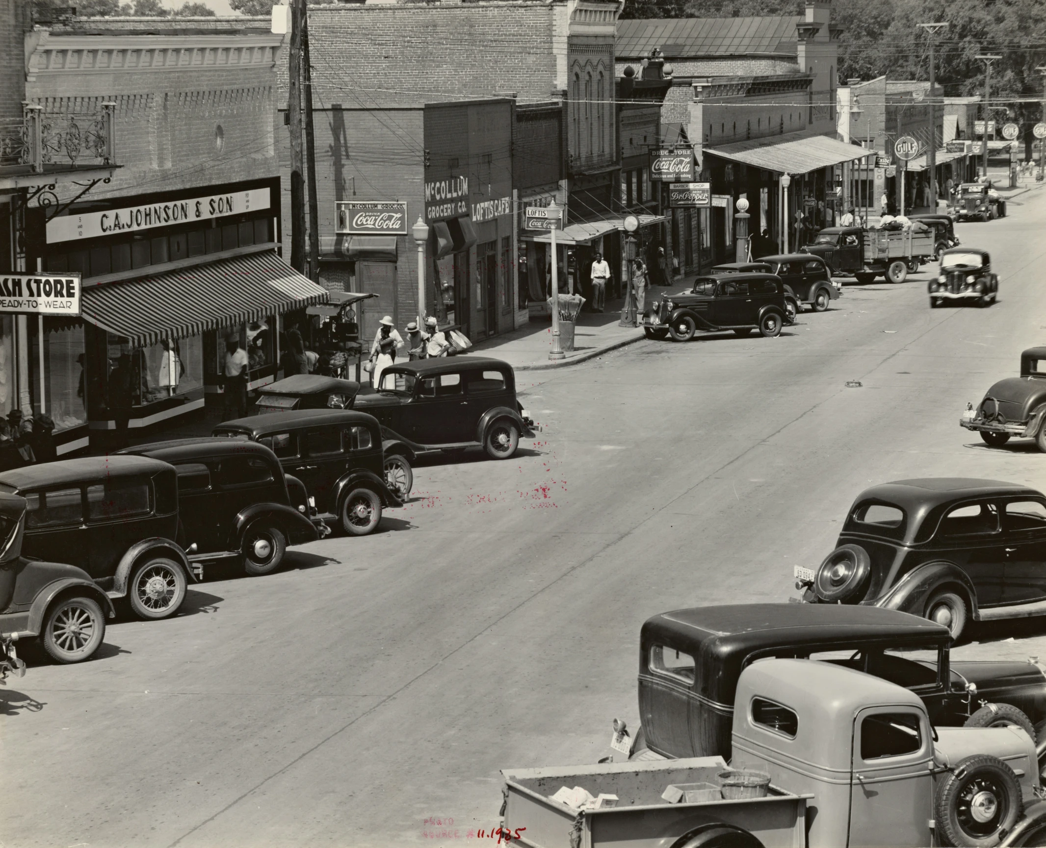 an old black and white po of an old town street