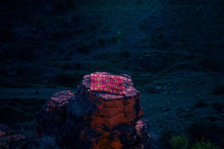 a tree stump with a colorfully decorated top