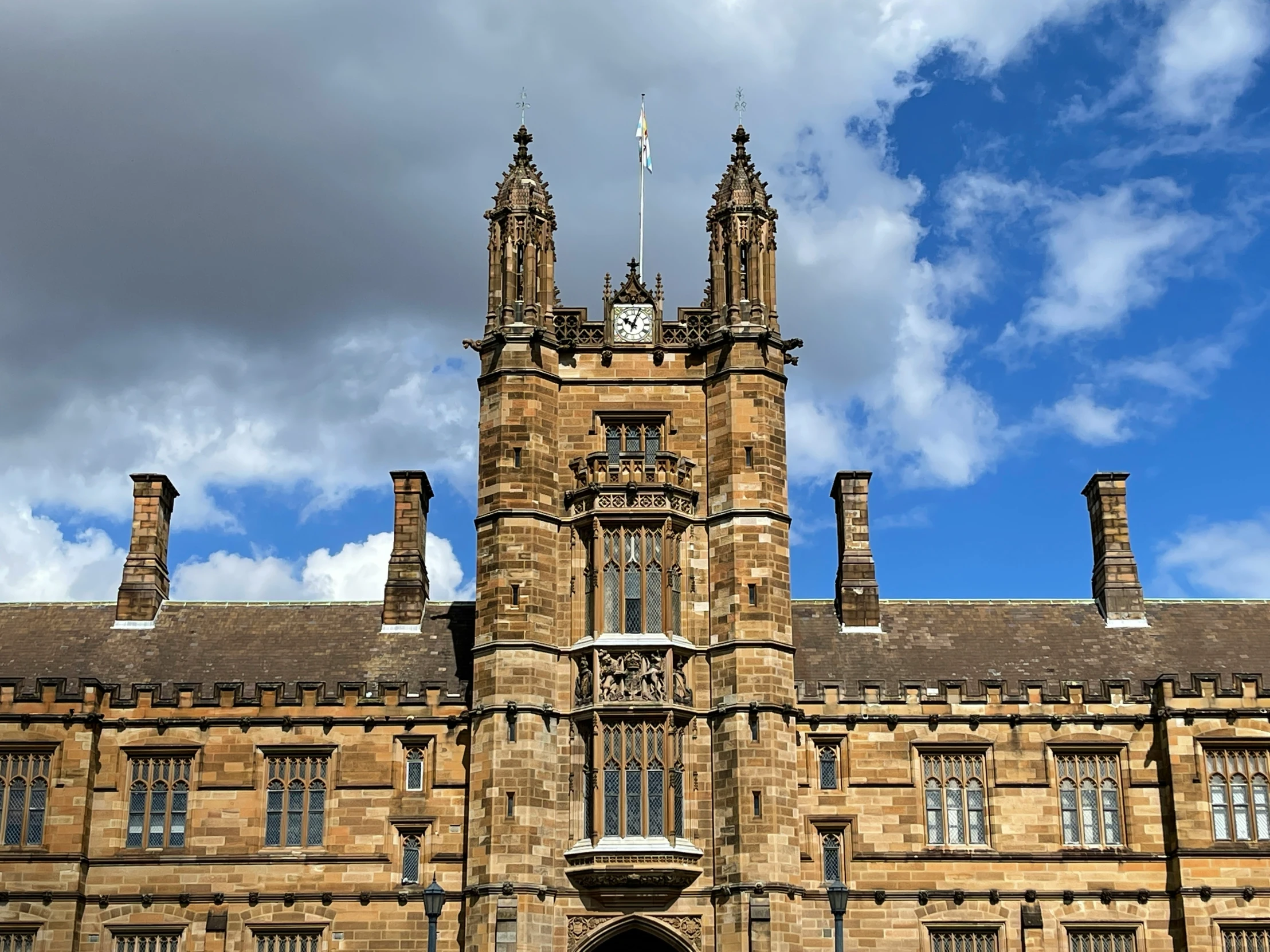 a large building has a tall tower with many windows