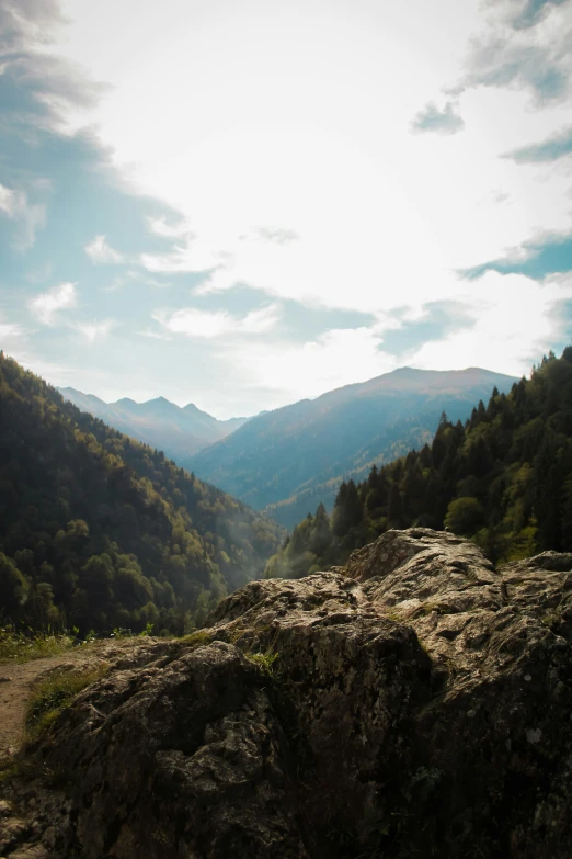 view of a rocky mountain with a river running through it