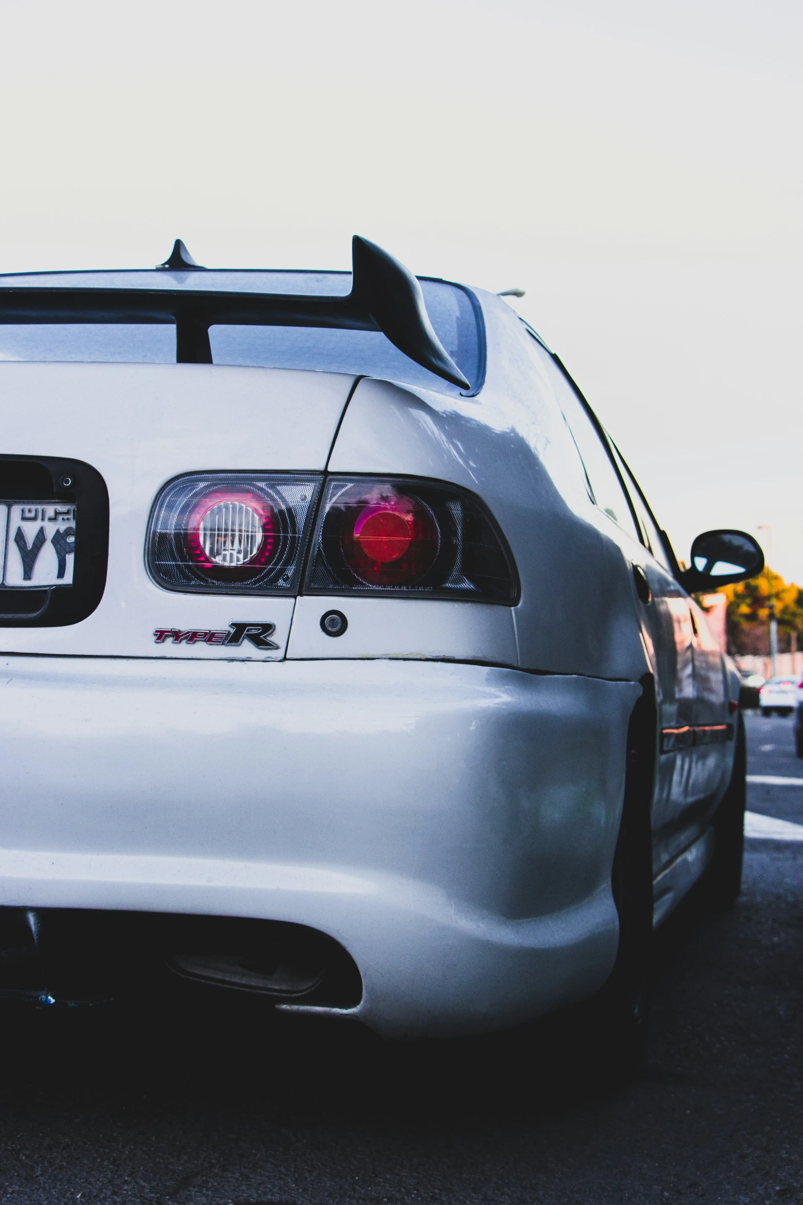 the back view of a car in a parking lot