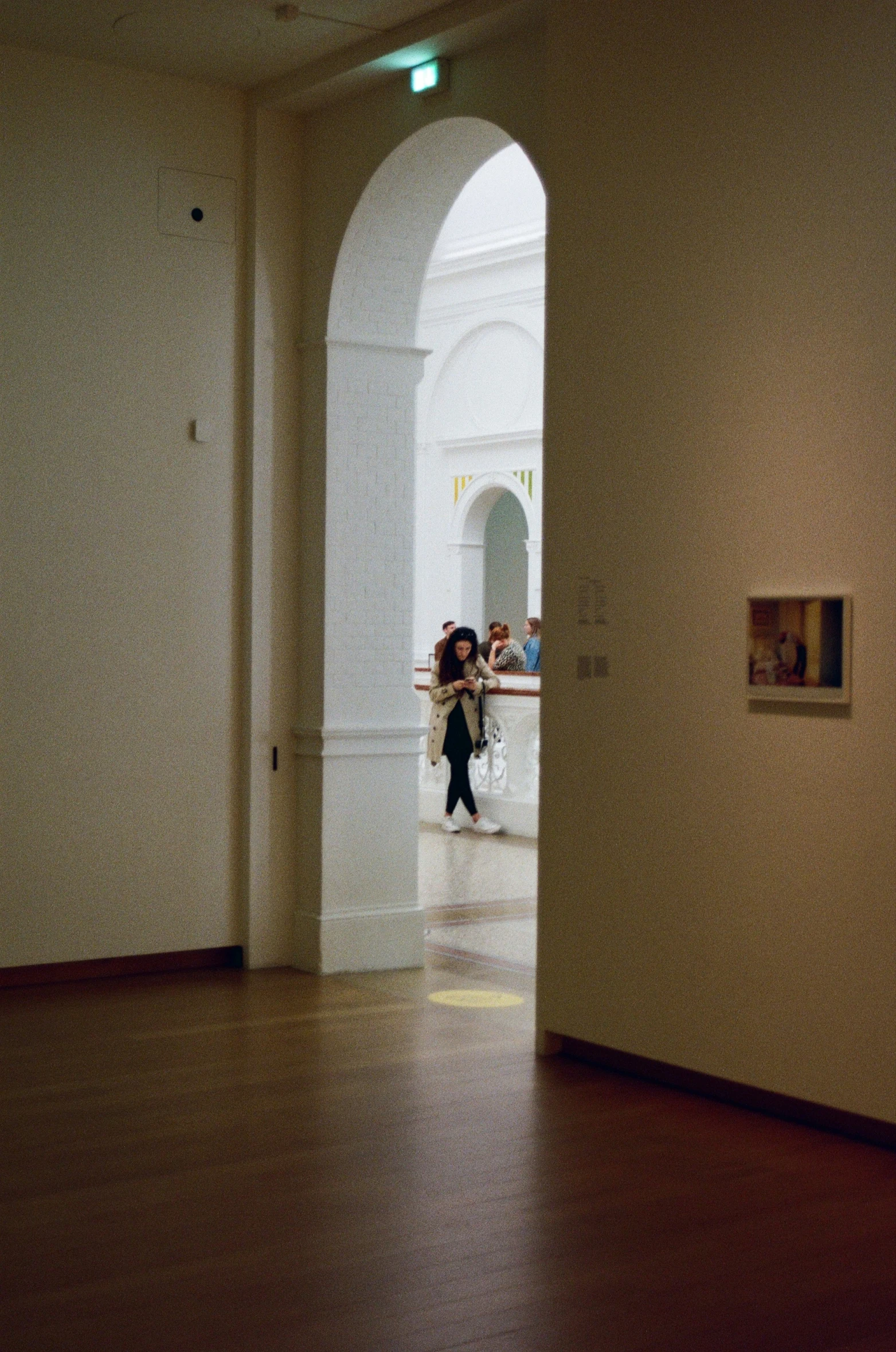 the view from an entrance into a building through a hallway