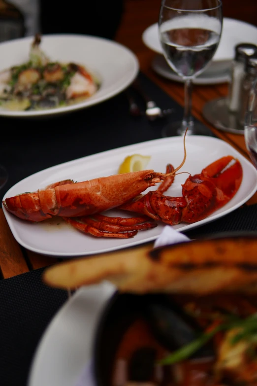 lobster dinner served on plates in the center