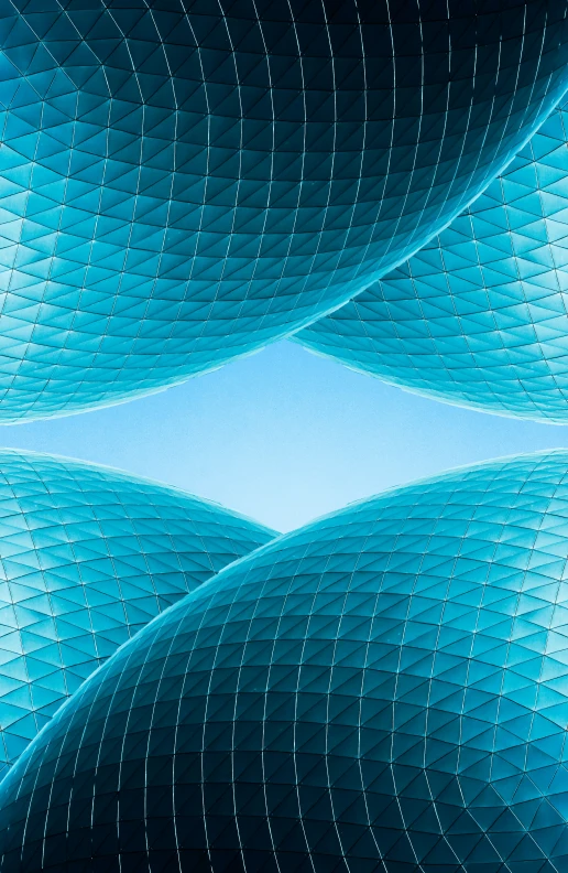 a blue computer background with wavy lines