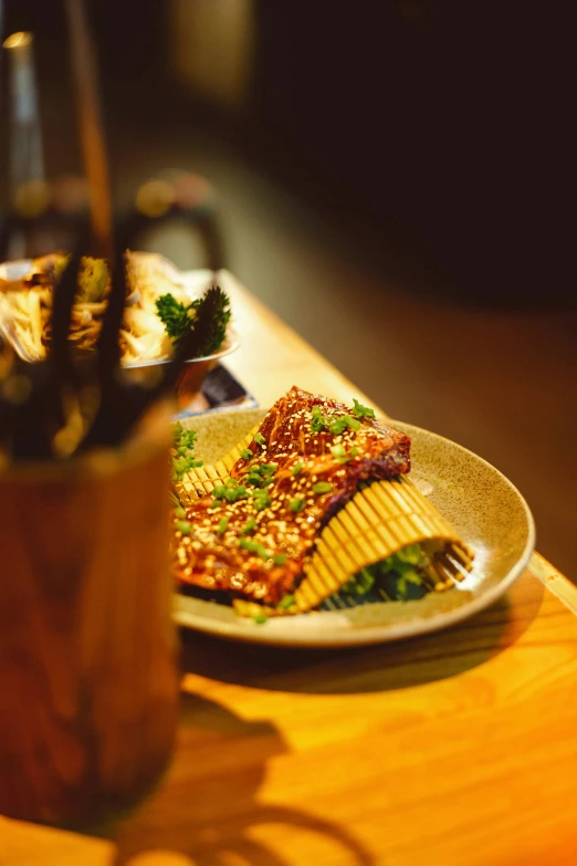 two plates with food on them, along with one with a drink