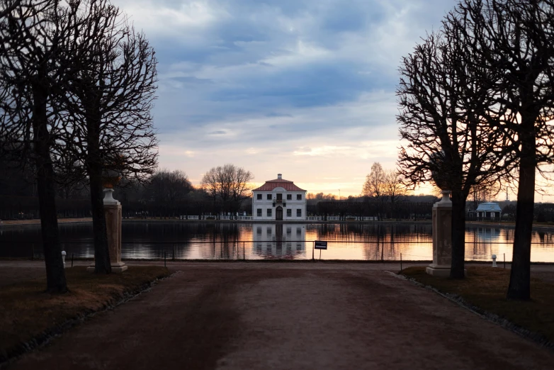 the large house is by itself in the lake