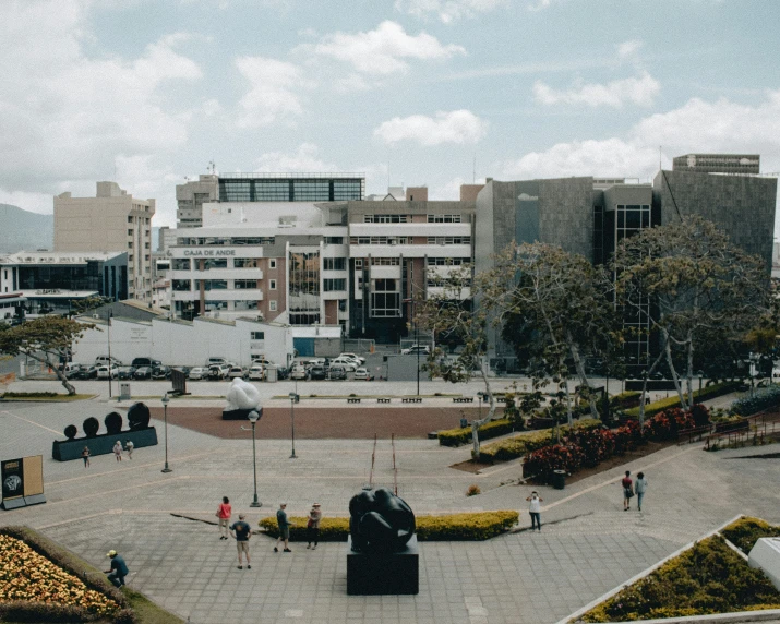 several large buildings and a lot of people