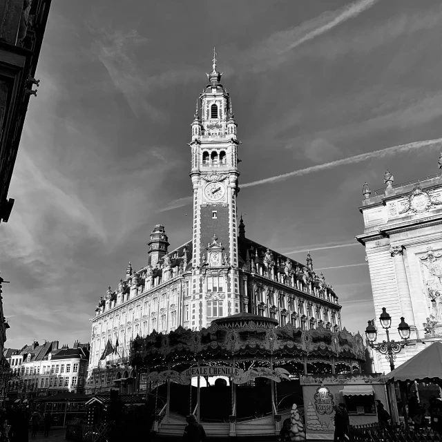 the tall tower has a clock on the front