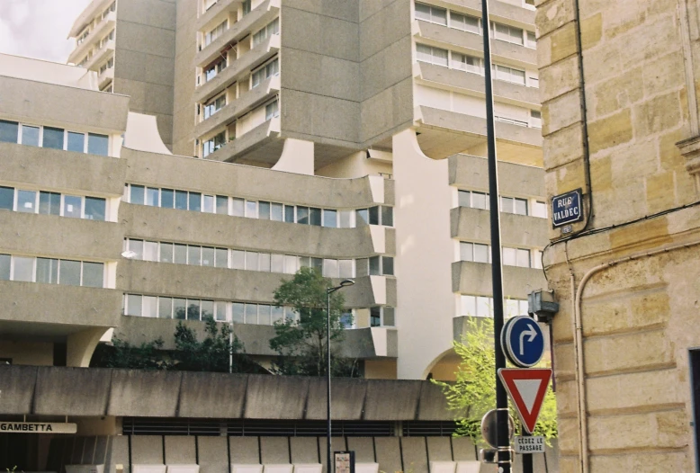 an old building with an office building in front