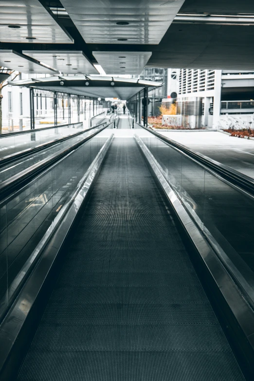 an empty subway station with only two people