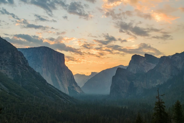 a scenic view of mountains in the valley