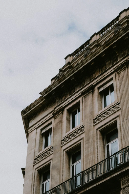 an upward po of the balcony balconies on an old building