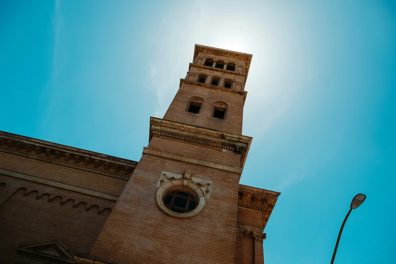 an old brick church with a clock tower