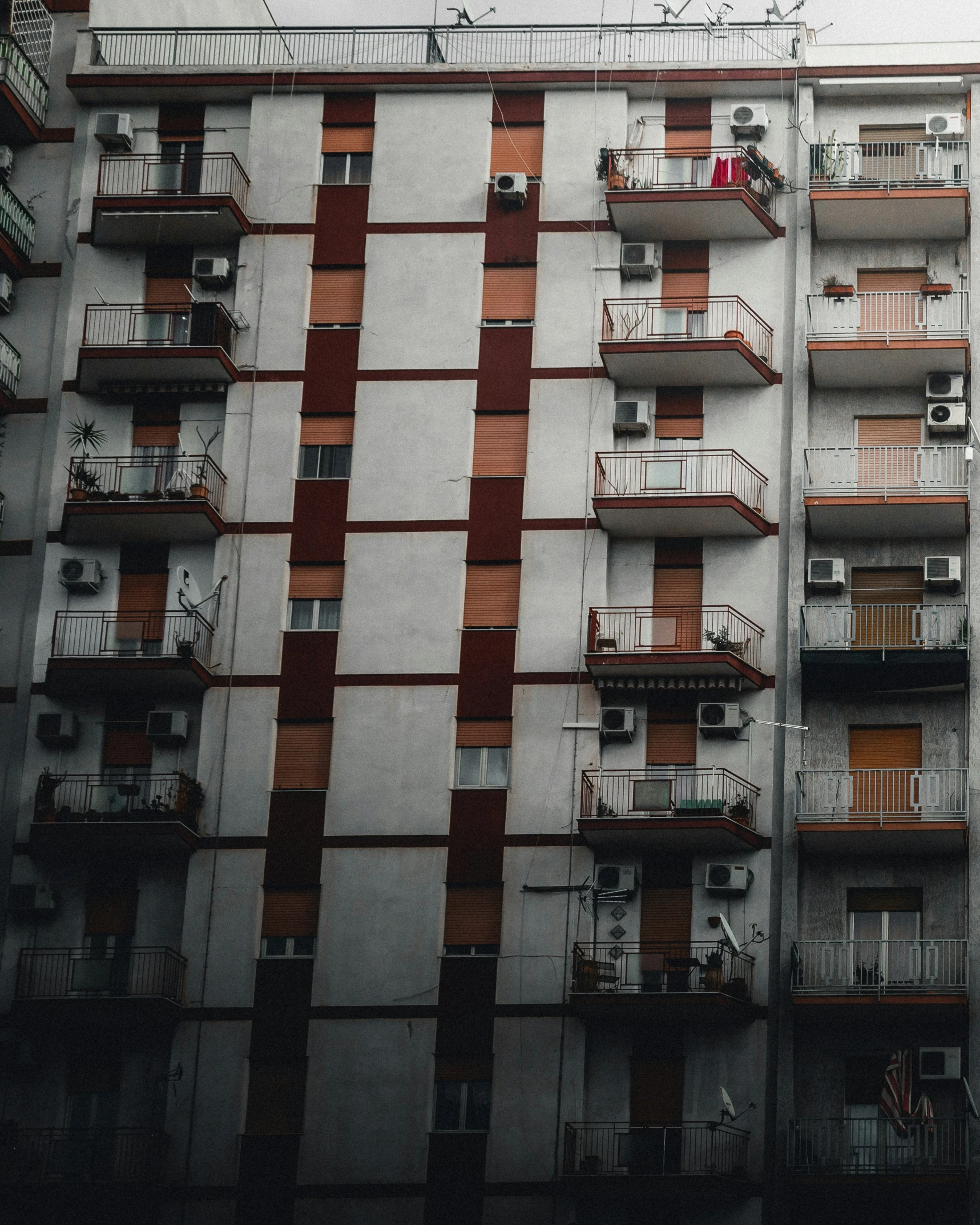 tall buildings with balconies and balconies next to each other