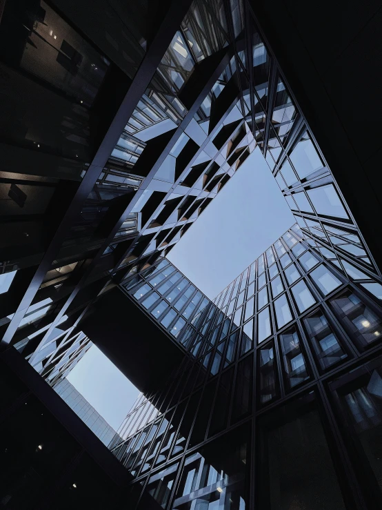 tall buildings towering up into the sky from below