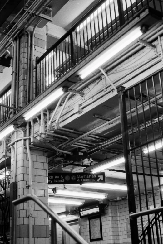 inside of an industrial building with metal staircase