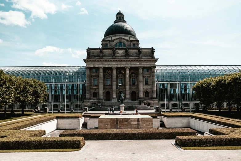 a building that has many statues in front of it