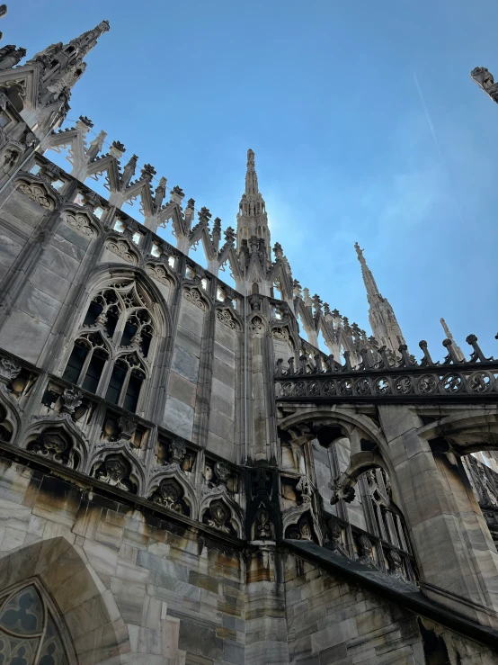 the top half of a gothic cathedral building