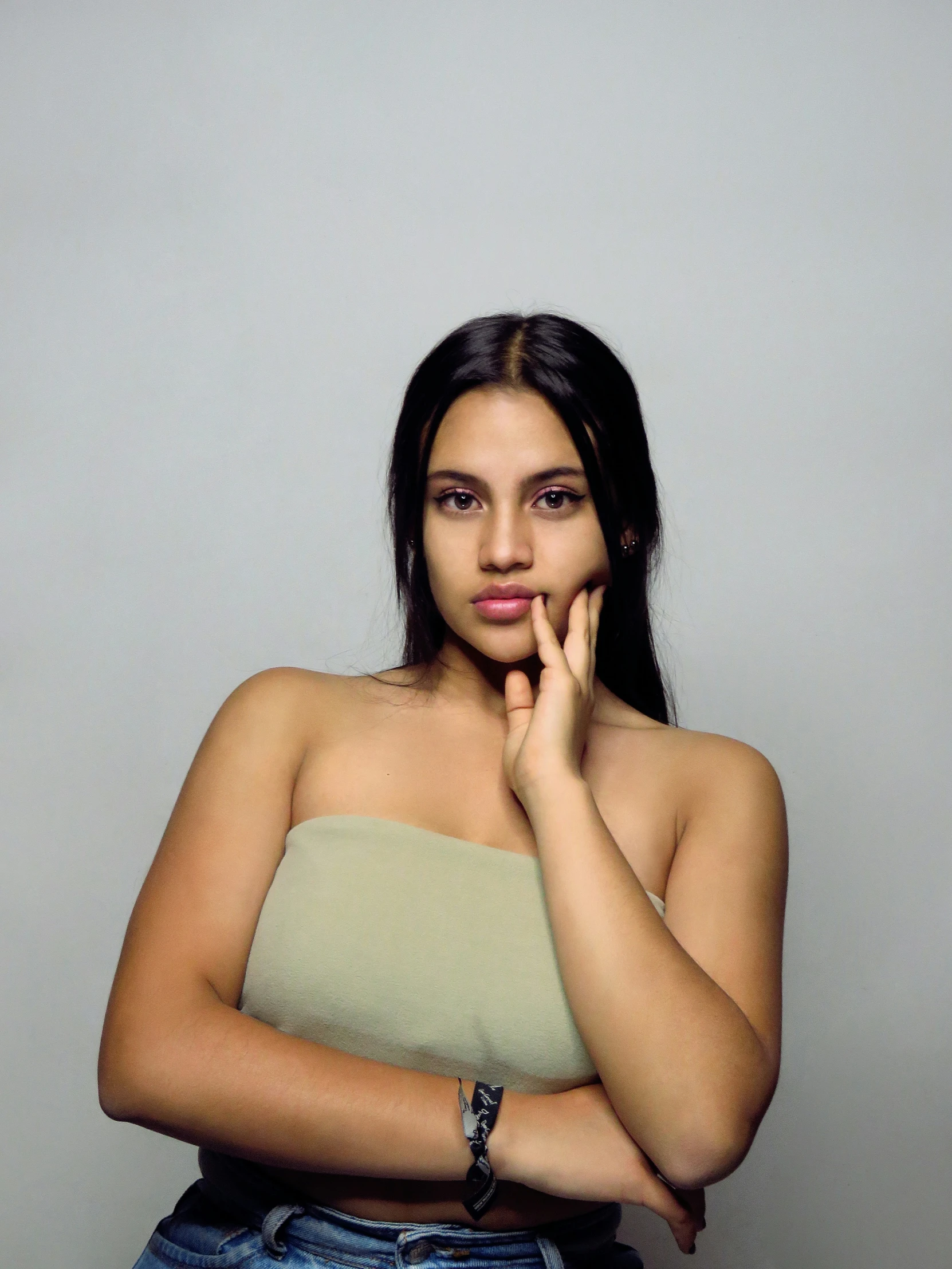 the young woman is posing in her underwear