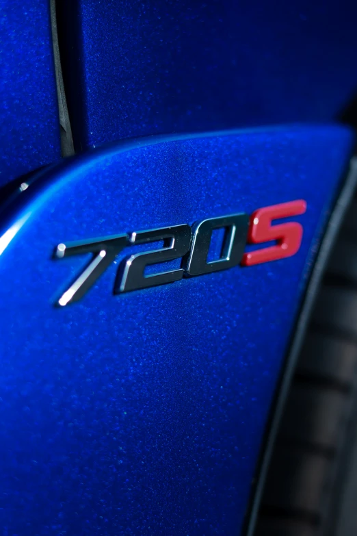 the word'715'is seen on a car emblem