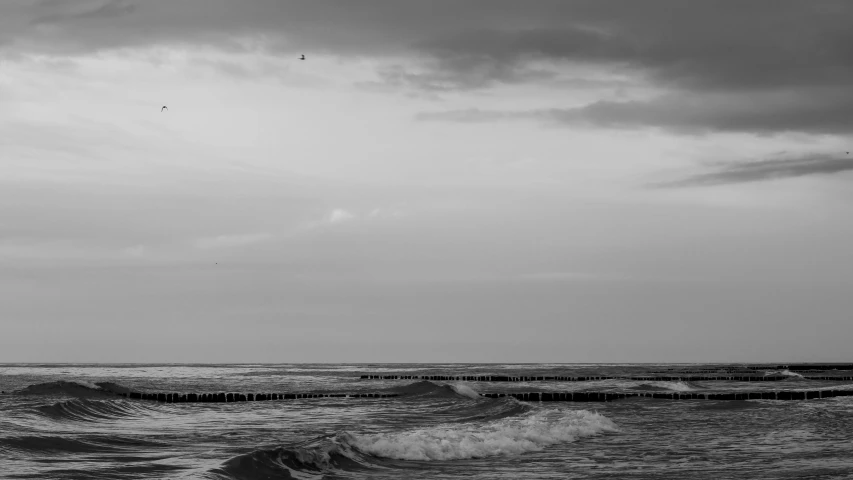 a black and white po of water waves