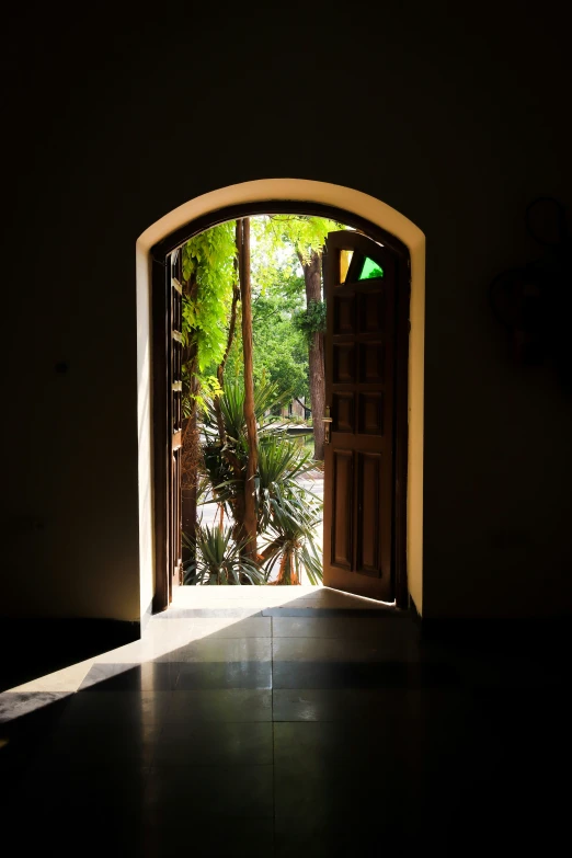 an open doorway with a wooden window in the center