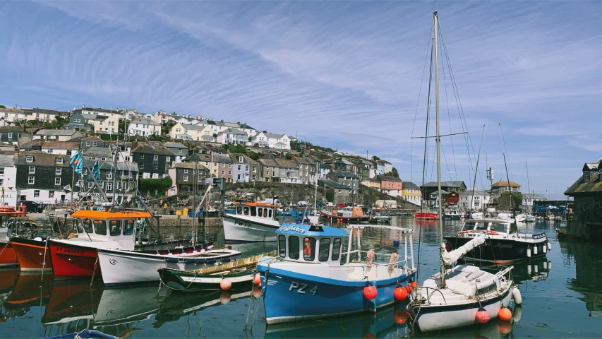 there are several boats that are in the water together