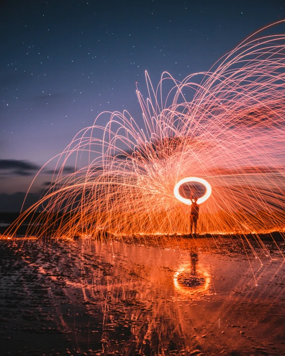 a man holding a spinning disk in the air